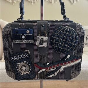 Mary Frances Mile High top-handle travel handbag